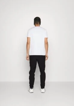 Ellesse Typic - Trainingsbroek - Black -Herenmode 3fe295f0bcb945439e18da8c770b6629